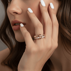Double Layered Gold Gemstone Ring worn on model's hand with polished nails, elegant and eye-catching design.