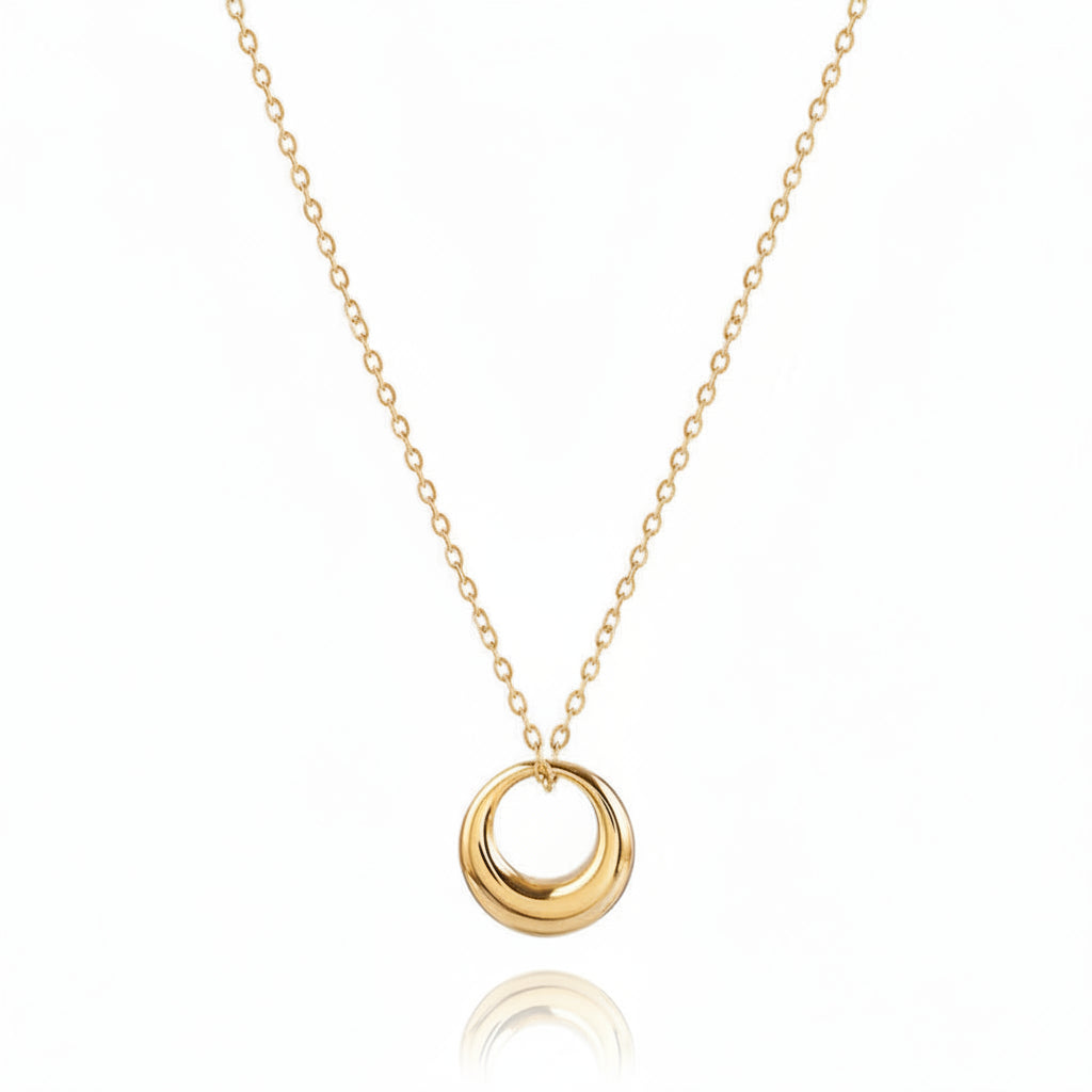 Mini Gold Circle Pendant Necklace featuring an open ring charm on a delicate gold chain.