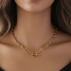 Ceyrah gold chain necklace with toggle clasp on woman’s neck, elegant jewelry