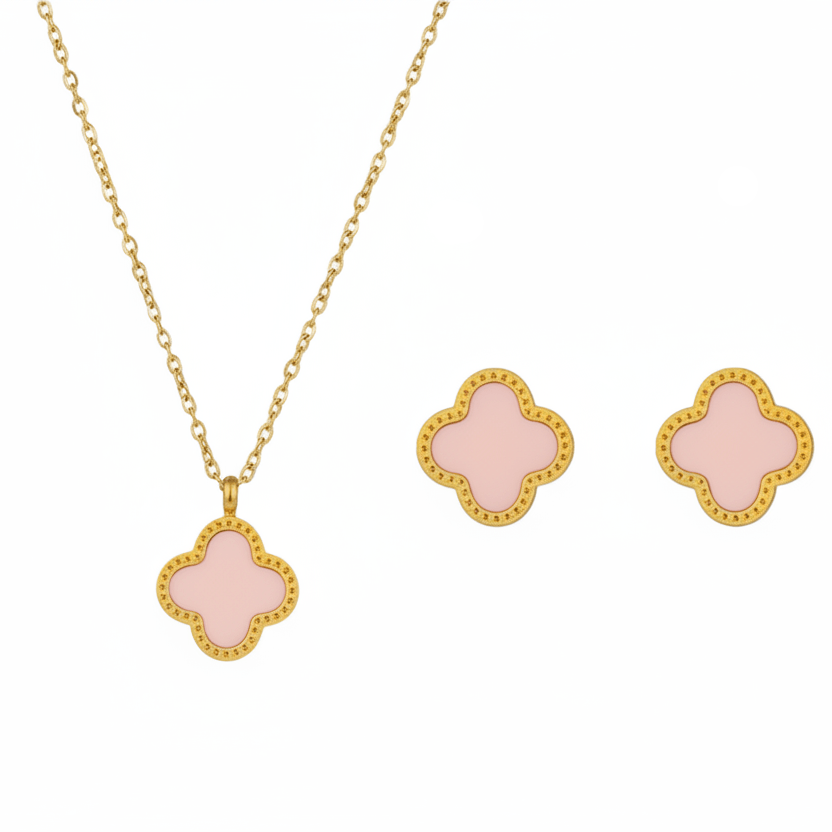 Clover Jewellery Gift Set - Jewellery set with pink clover-shaped pendants on gold chains.