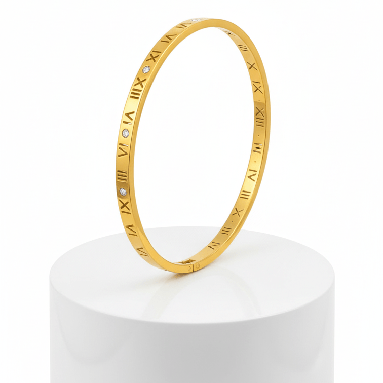 Roman Numeral Bangle with Zircon Accents on pedestal 