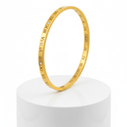 Roman Numeral Bangle with Zircon Accents on pedestal 
