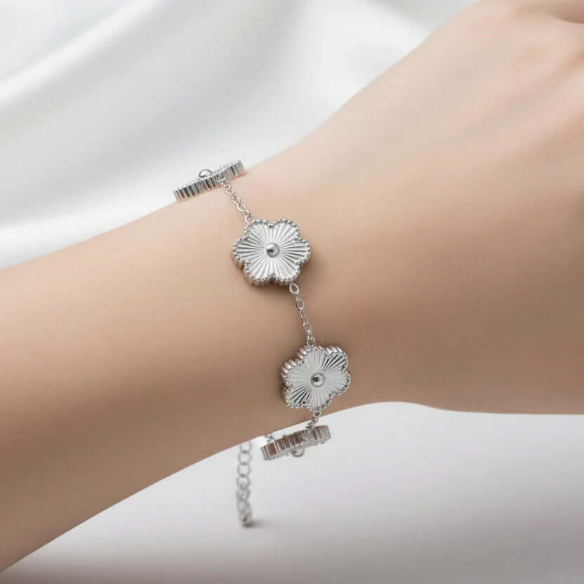 Five Leaf Clover Bracelet featuring a silver charm on an adjustable chain, perfect for everyday wear.