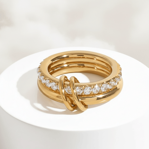 Double Layered Gold Gemstone Ring featuring a polished gold band and clear stones, perfect for everyday wear.