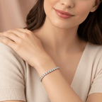 Woman wearing a Silver Crystal Tennis Classic Bracelet on a neutral background