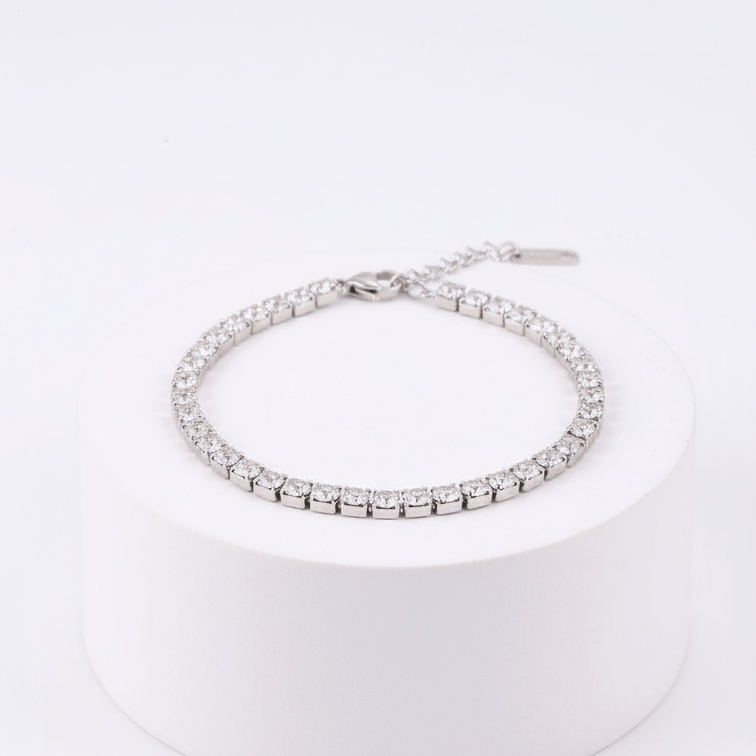 Silver Crystal Tennis Classic Bracelet on a white stand with a white background