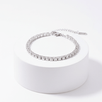 Silver Crystal Tennis Classic Bracelet on a white pedestal with a white background