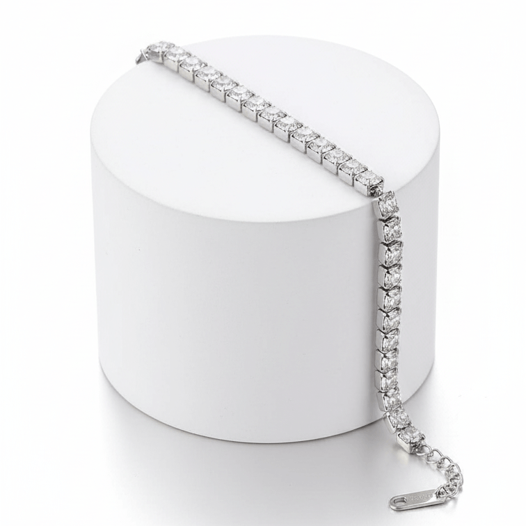 Silver Crystal Tennis Classic Bracelet on a white cylindrical box with a white background