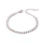 Silver Crystal Tennis Classic Bracelet with clear stones on a beige background