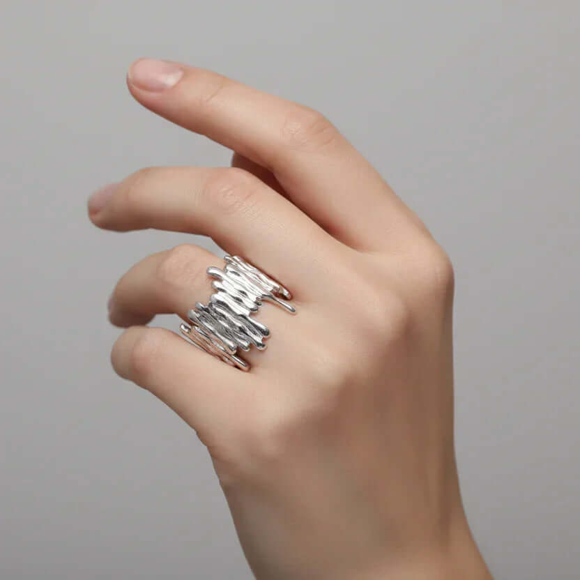 Hand wearing Silver Molten Texture Ring, Ceyrah jewellery