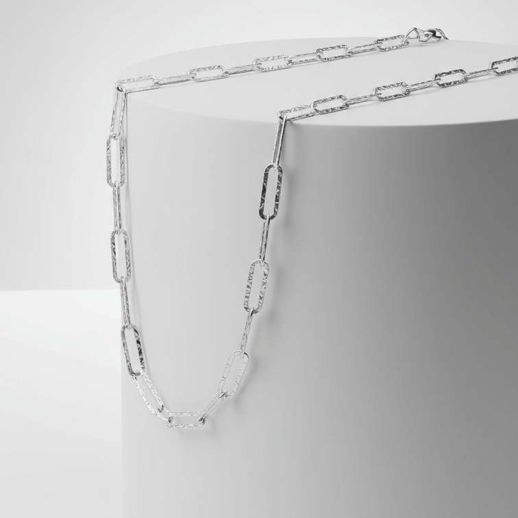 Silver Paperclip Chain Necklace white pedestal 