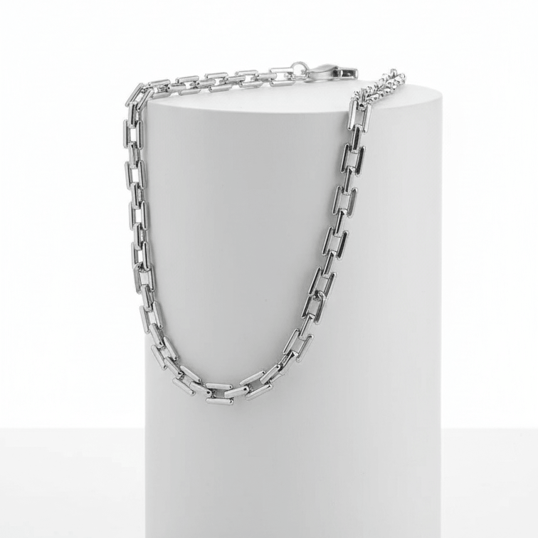 Ceyrah - Silver Rectangular Link Chain Necklace on white pedestal