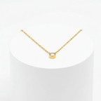 Single Diamond Necklace Gold on white pedestal
