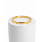 Small Clover Bangle Bracelet gold on white pedestal