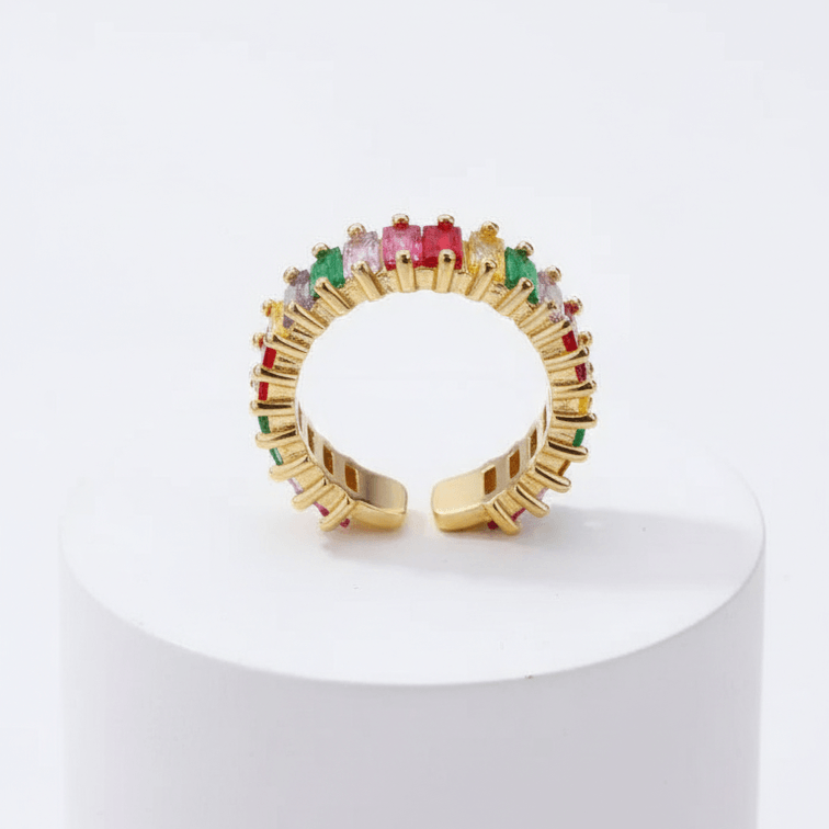 Spectrum Baguette Eternity Ring on white pedestal
