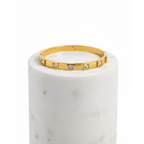 Square Crystal Bangle Bracelet on white marble pedestal