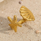 Starfish & Shell Open Ring Gold on a beige background