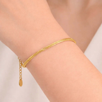 Ceyrah gold Textured Snake Chain Bracelet with adjustable clasp on wrist, minimalist jewelry
