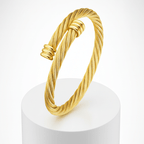 Twisted Cable Cuff Bracelet on marble pedestal