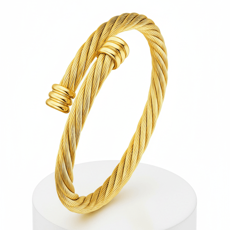 Twisted Cable Cuff Bracelet on white pedestal