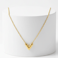 V-Shaped Necklace Gold on white pedestal