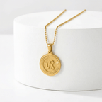 Zodiac Sign Medallion Necklace Gold on a white surface