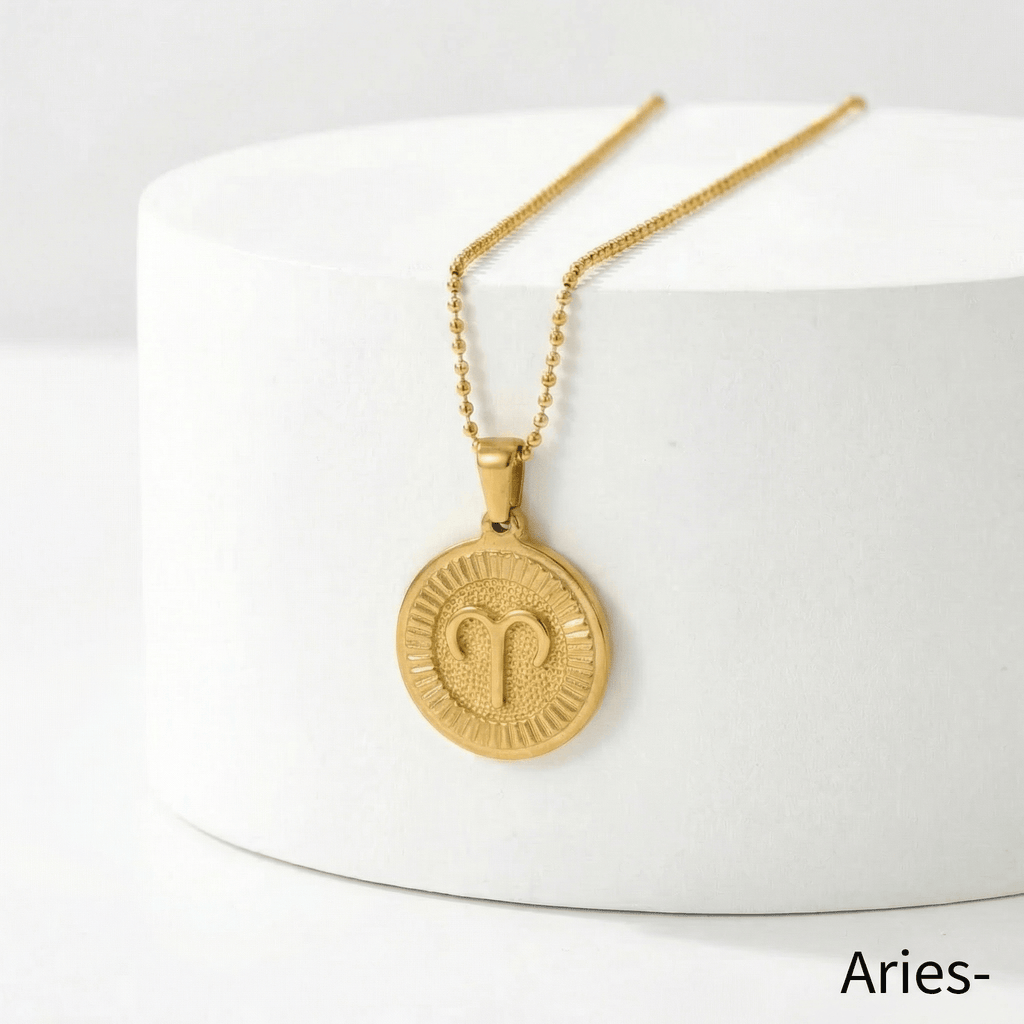 Zodiac Sign Medallion Necklace Gold with Aries zodiac sign pendant on a white surface