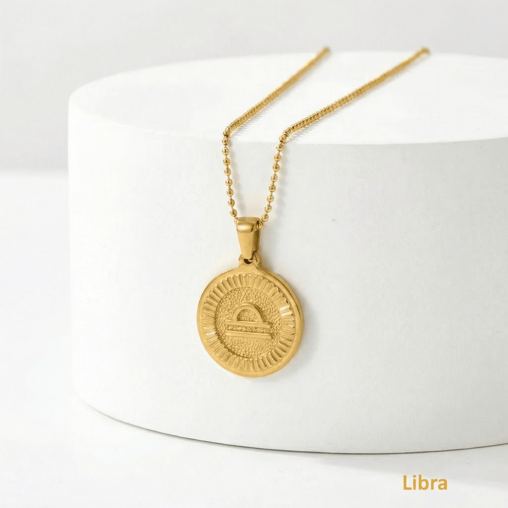 Zodiac Sign Medallion Necklace Gold with Libra pendant on a white background