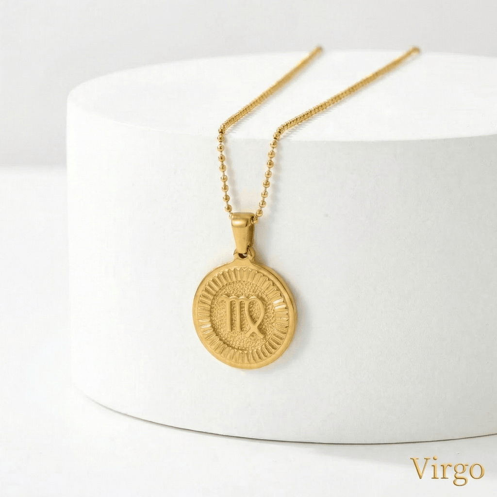 Zodiac Sign Medallion Necklace Gold with a Virgo pendant on a white surface