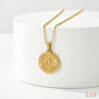Zodiac Sign Medallion Necklace Gold with a Leo zodiac pendant on a white background