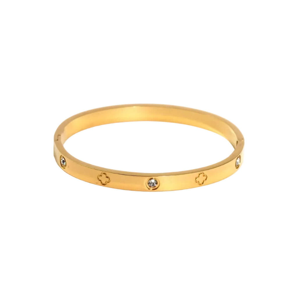 Ceyrah gold clover engraved diamond bangle bracelet on white background
