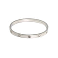 Silver clover engraved diamond bangle bracelet from Ceyrah