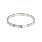 Silver clover engraved diamond bangle bracelet from Ceyrah