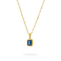 Ceyrah gold blue stone pendant necklace on white background
