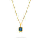 Ceyrah gold blue stone pendant necklace on white background