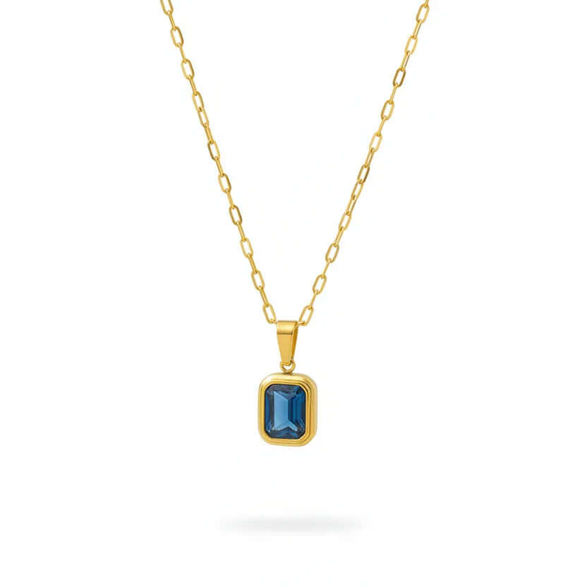 Ceyrah gold blue stone pendant necklace on white background