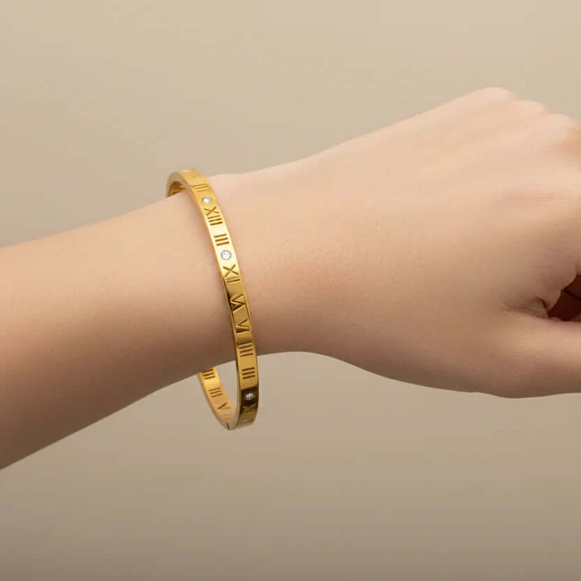 Gold roman numeral bangle with zircon accents jewellery from Ceyrah