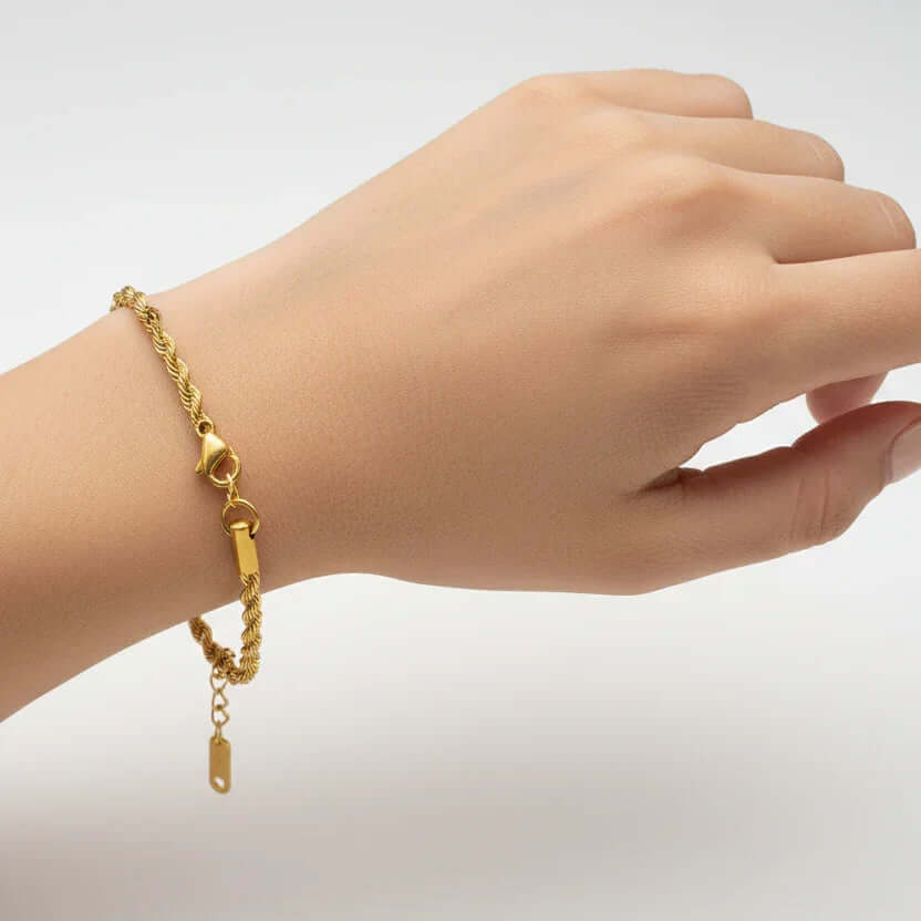 Gold rope chain bracelet on wrist, Ceyrah jewellery, minimalist design.