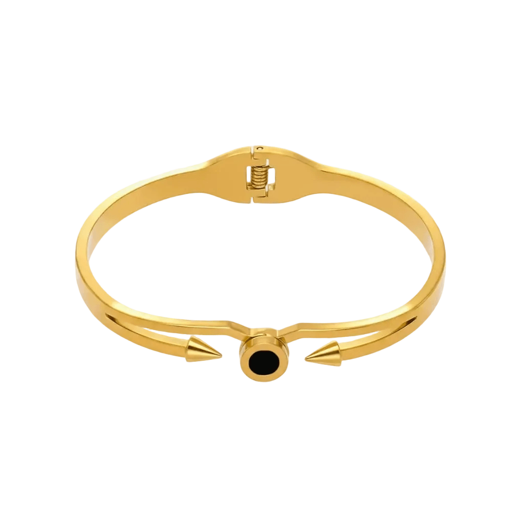 Ceyrah gold spike cuff bracelet with black accent on white background