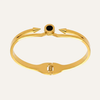 Ceyrah gold spike cuff bracelet with black accent on white background
